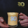 Man Holding SO Coffee Latte Glasses With Coffee In It
