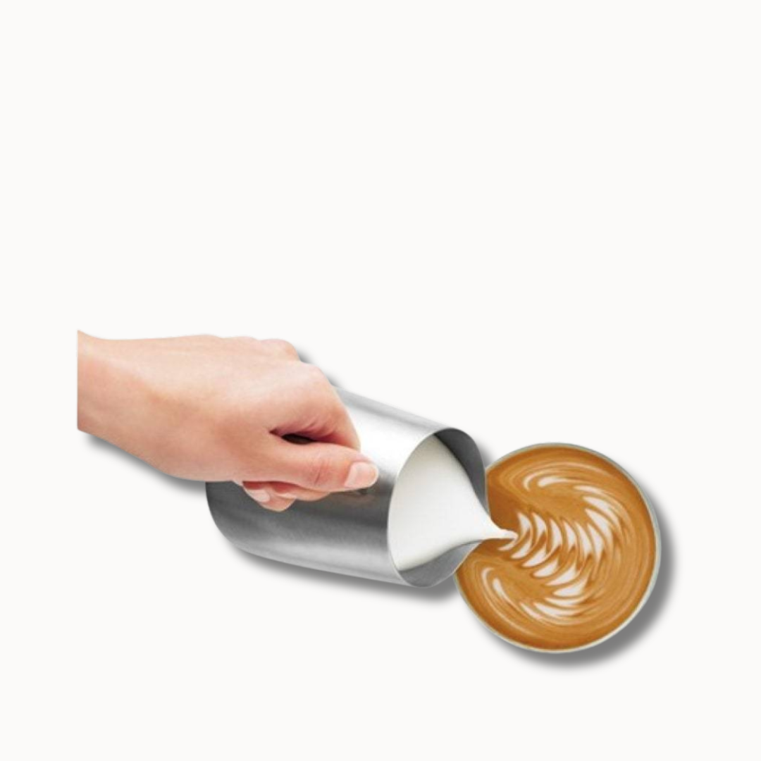 Milk Pouring Into Coffee