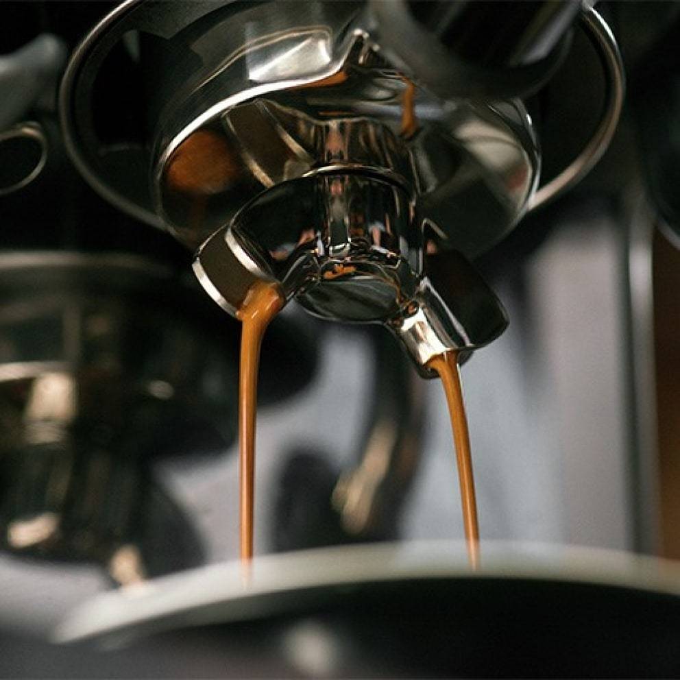 Coffee Pouring From Machine